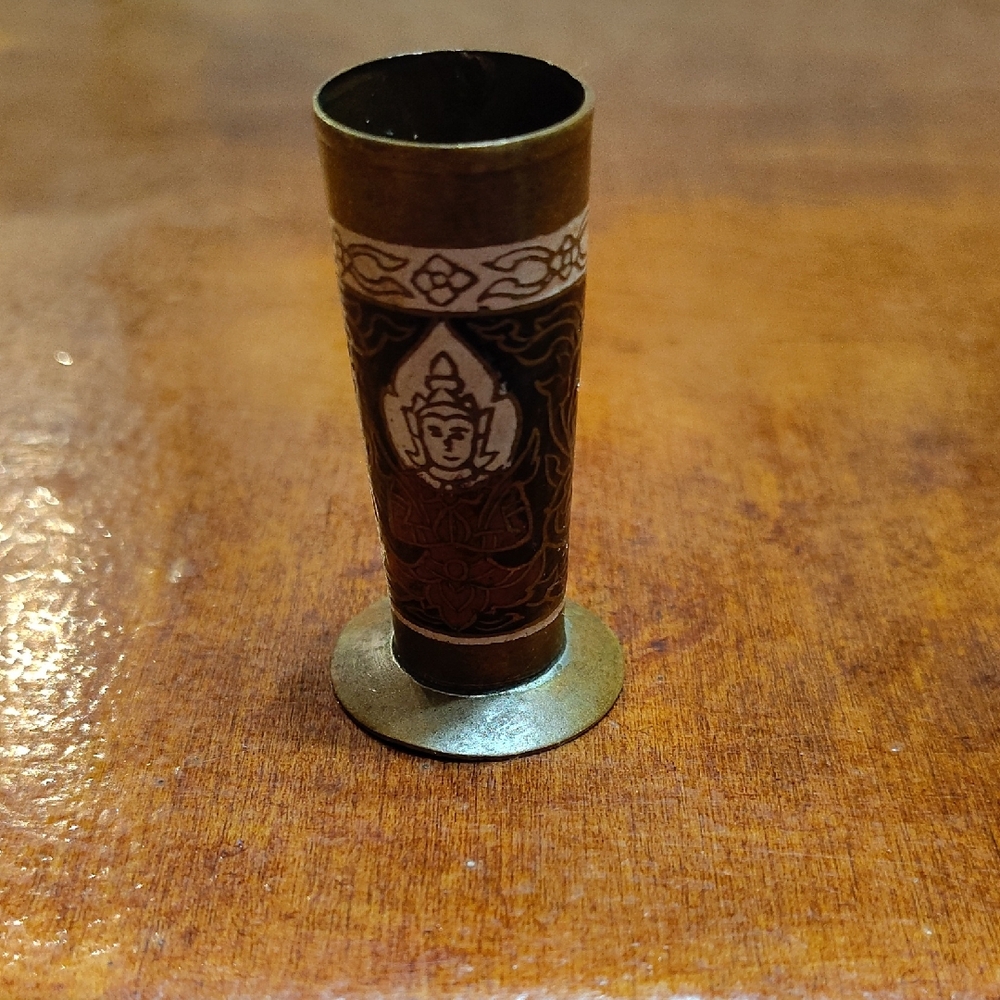 This item is a vintage Siamese/Thai ornate brass holder